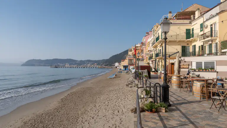 Sandy beach and promenade in Alassio