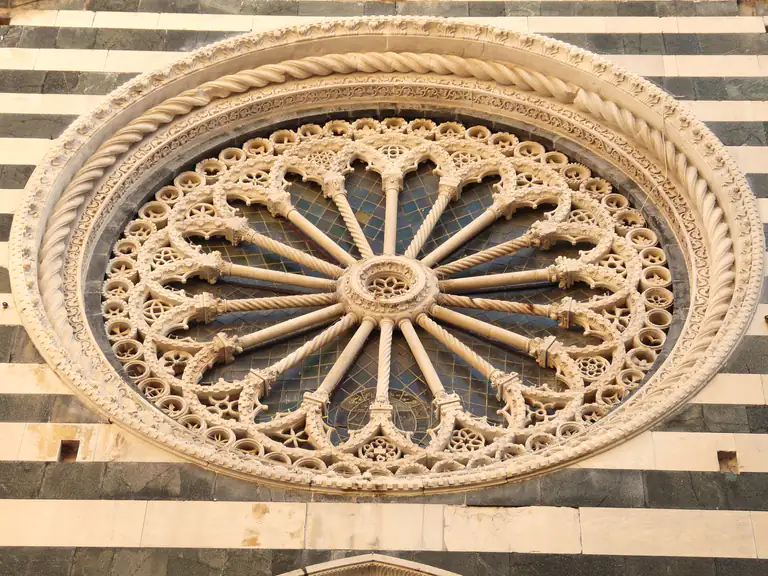 Marble rose window of San Giovanni Battista church in Monterosso