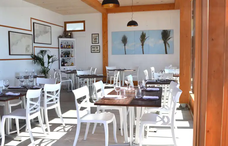Bright dining room of Amarea restaurant in Bordighera